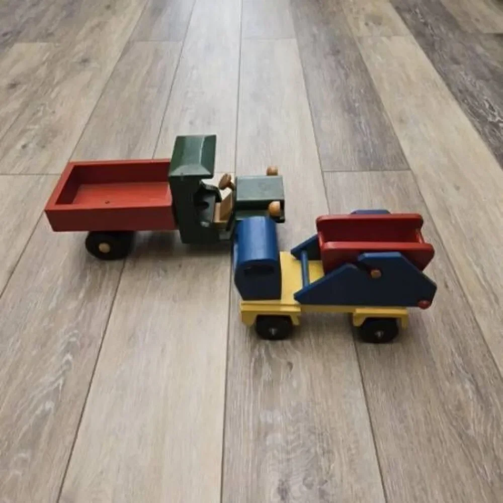 2 vintage Romania toy wooden trucks colorful, moving parts collectible